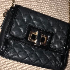 C. Wonder Black faux leather crossbody